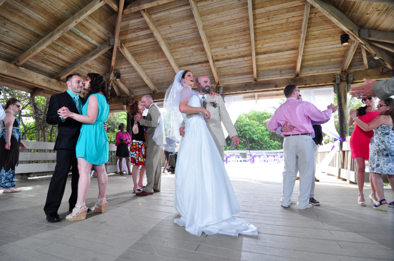 Bride and groom dance at Boca Raton wedding - Red Reef Park