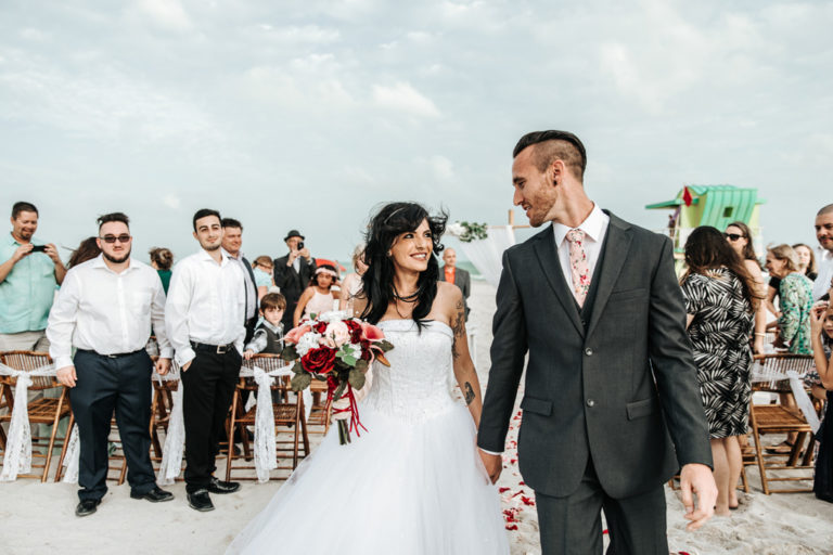 A Picture of a Miami Beach Wedding Recessional on the beach.