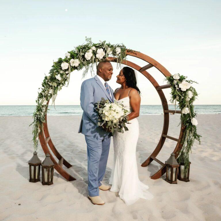 Weddings on Miami Beach with a Circular Wedding Arch and white florals