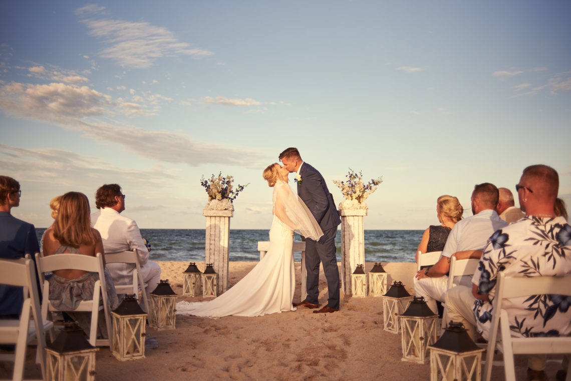 Bride and groom kiss - beach wedding in Lauderdale-by-the-Sea