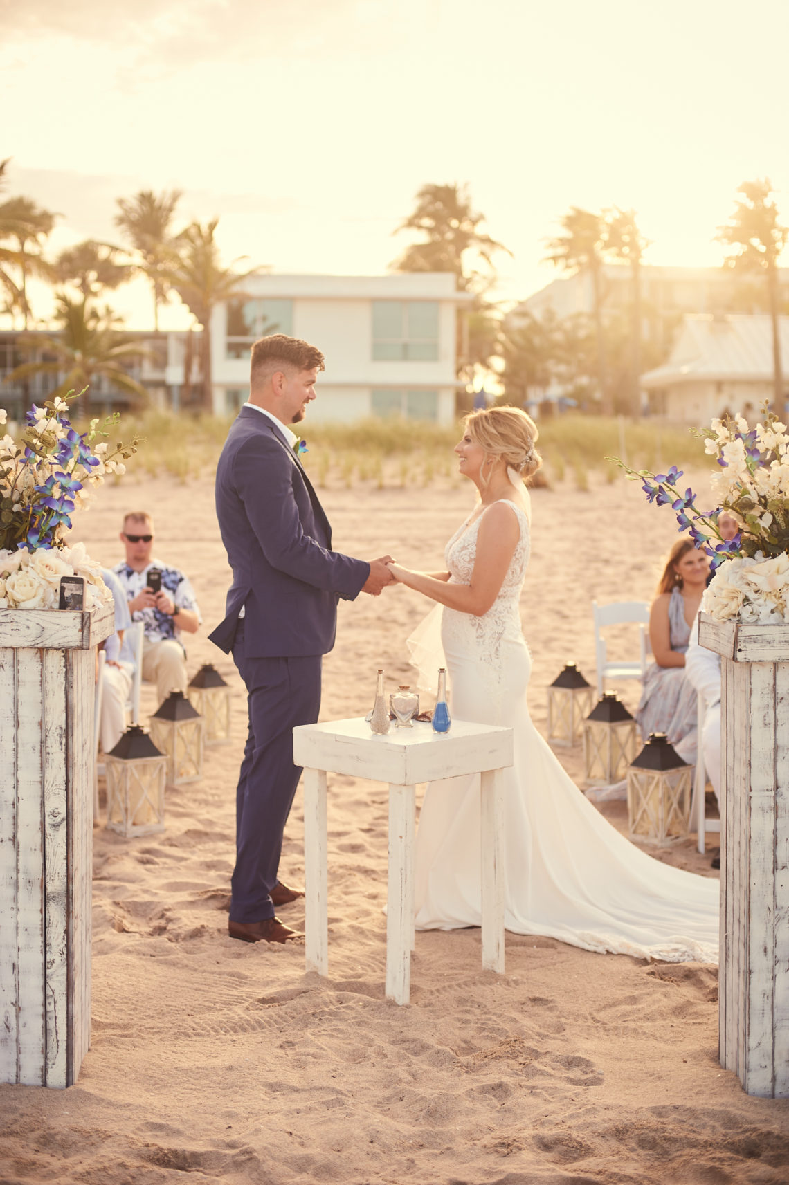 Bride and Groom smile and look into each other's eyes, Lauderdale-by-the-Sea beach wedding