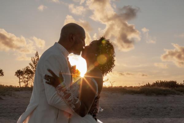 Fort-Pierce-Beach-Wedding-Ceremony-kiss